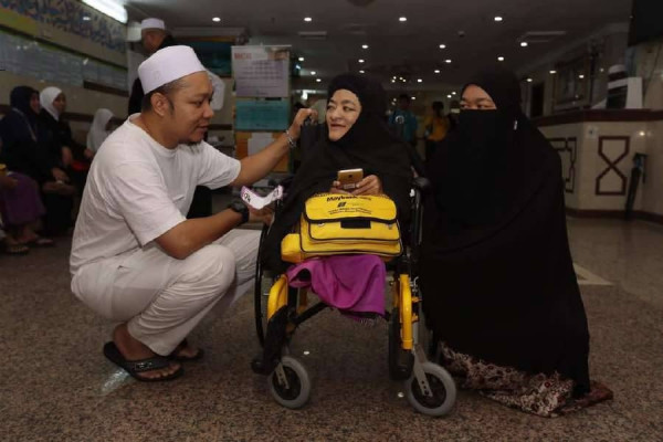 Free seats for disabled pilgrims