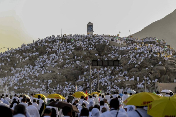 Pilgrims gather on Mount Arafat at the climax of their Haj