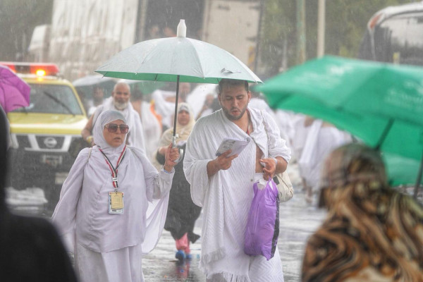 Heavy rain pours down on Hajj pilgrims at Arafat