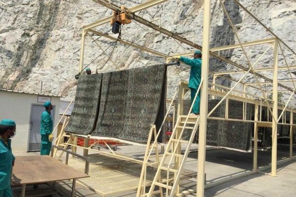 Cleaning prayer rugs a multi-phase mission in Makkah