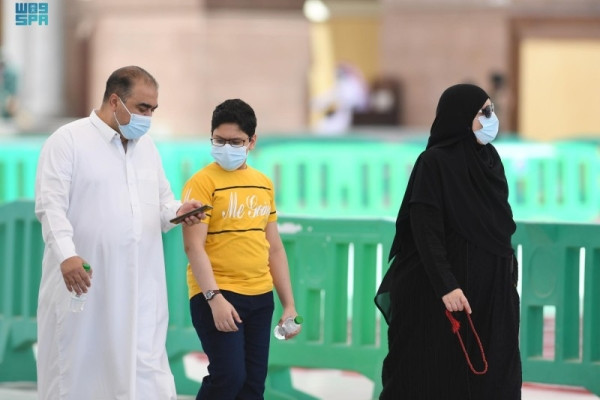 Fully vaccinated teenagers celebrate reentry to Prophet’s Mosque after a hiatus of 18 months